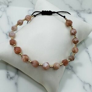 Sophisticated Gold and Brown Bracelet with Adjustable Fit
